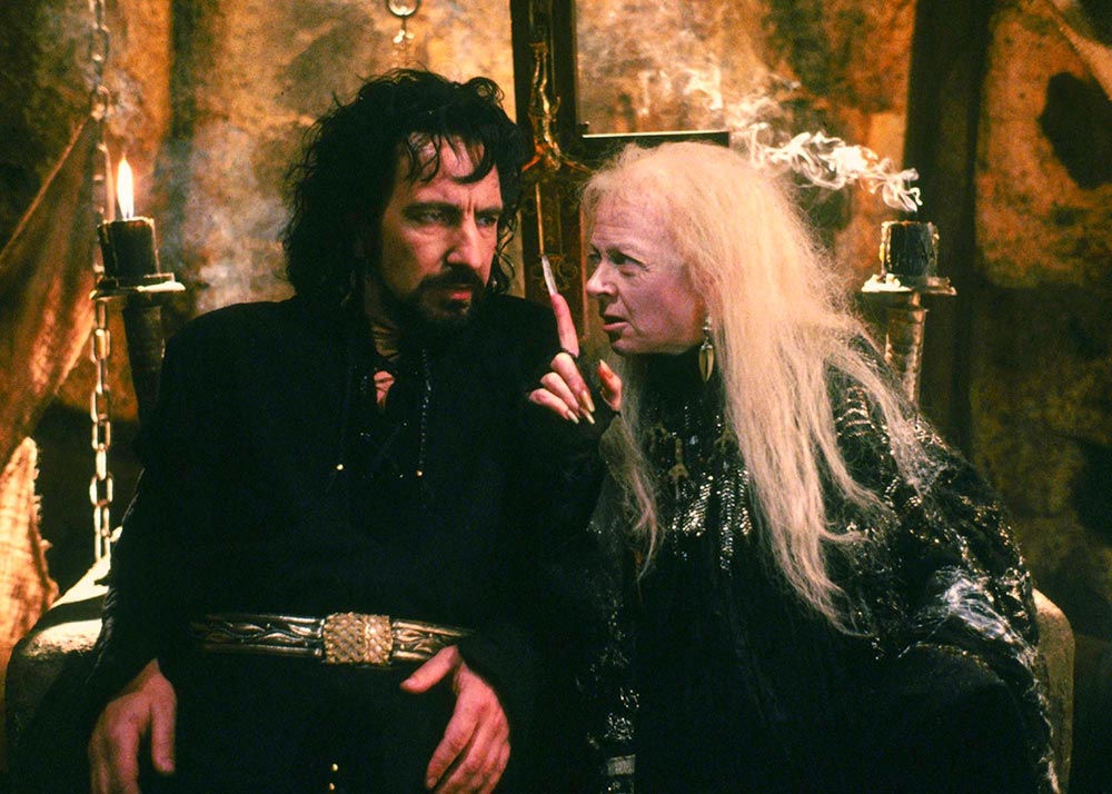 Alan Rickman, true star of the film, with his witch assistant played by Geraldine McEwan