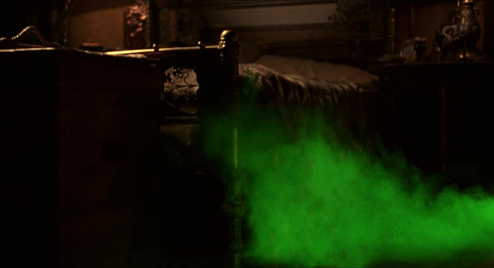The green mist approaches Mina's bed