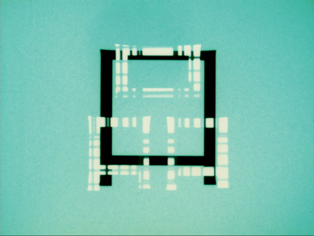 Lily Jue Sheng, Change 变 (2023), 16mm double-projection. Above reads: 口 (kou) “mouth” and 品 (pin) “commodity.”