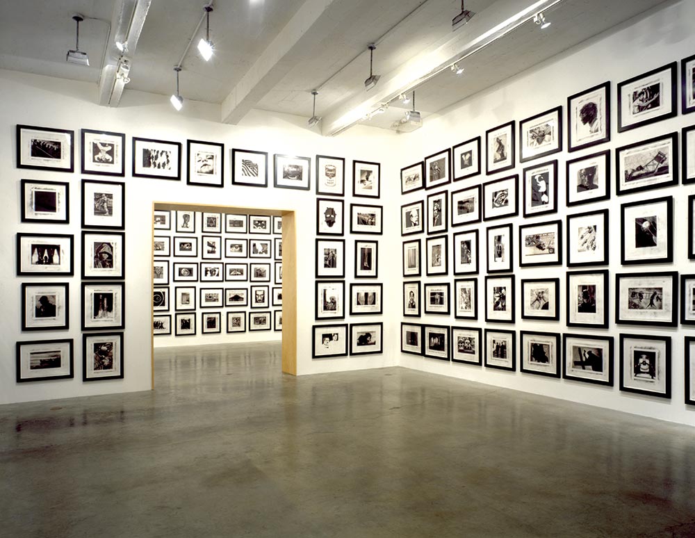 Installation view of Longo's solo exhibition Magellan, 1997. Metro Pictures, New York.