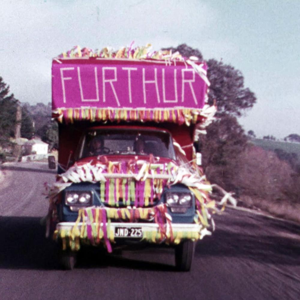 A colorful truck drives toward the camera.